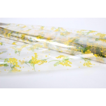 Celofán žlutá mimóza na bílém podkladu | WrapCo